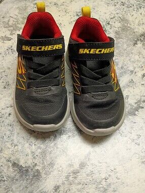 Skechers Kids Black Sneakers with Red and Yellow Accents
